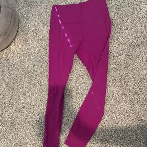 Athleta salutation stash leggings with pockets. Very gentle used. Small.